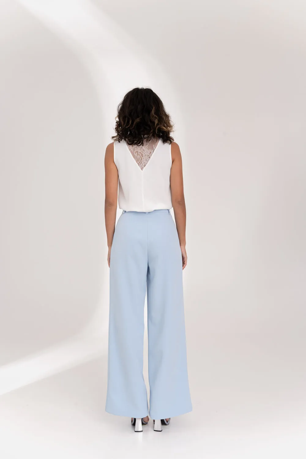 Light blue wide-leg trousers with side pockets
