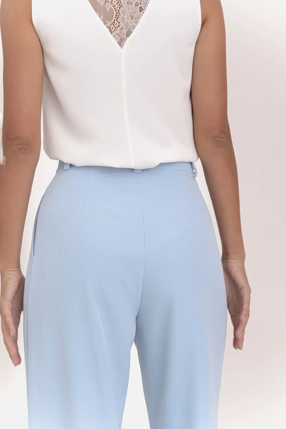 Light blue wide-leg trousers with side pockets