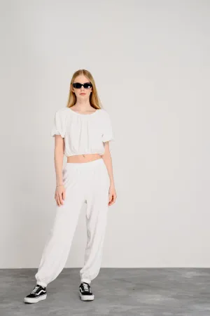 Loose two-piece suit in milky color